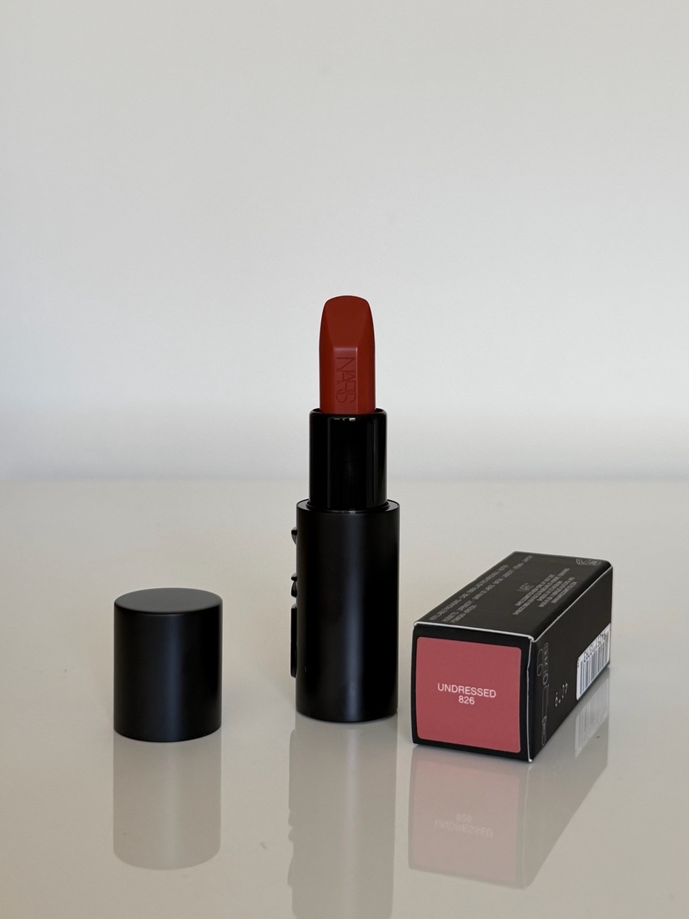 NARS Undressed Satin Lipstick — Warm Brick Red